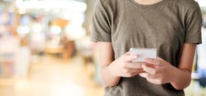 Woman searching on mobile device.
